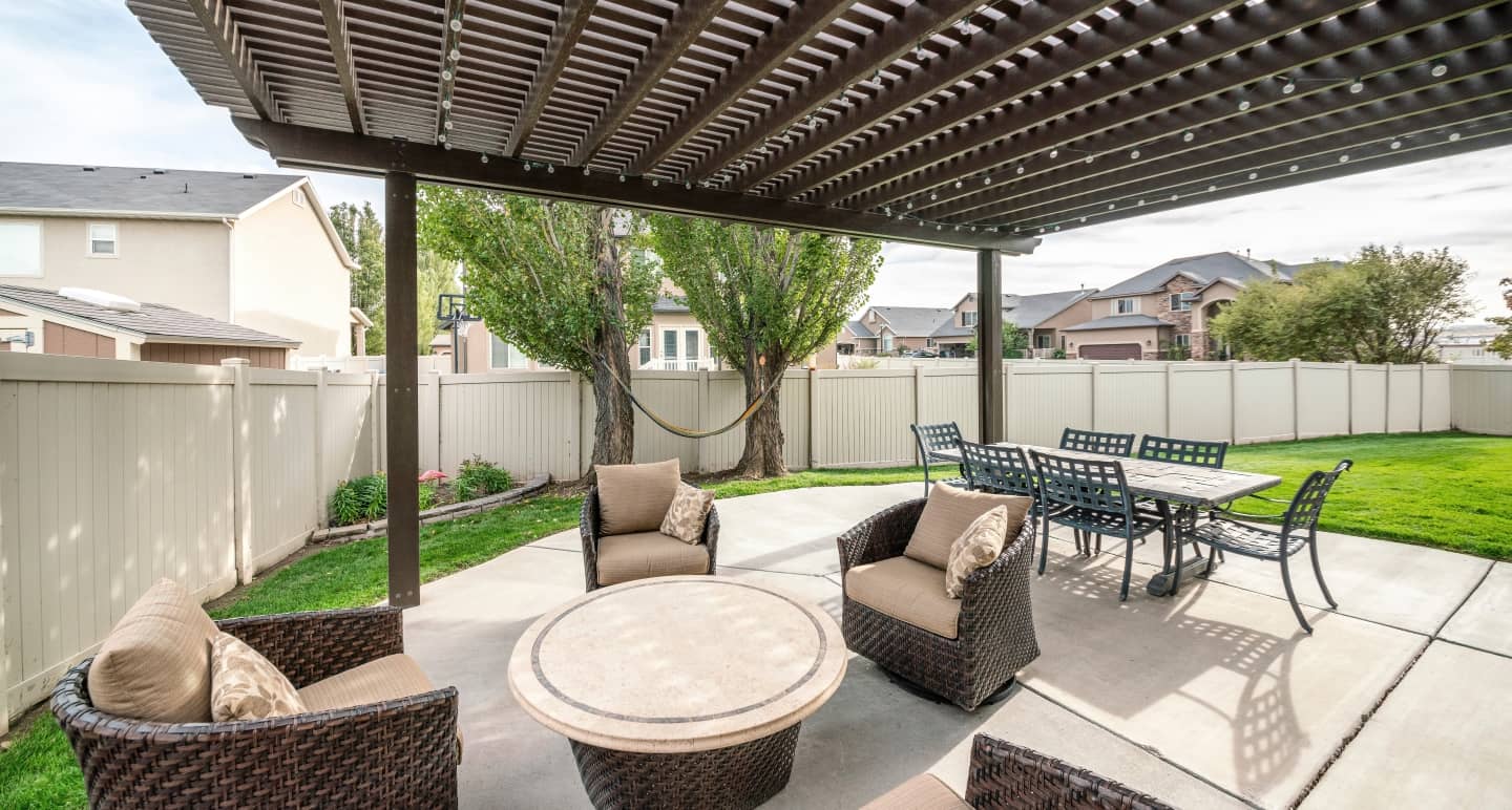 A pergola is a structure with vertical posts or pillars that support cross-beams and a durable open lattice, often covered with vines or fabric.